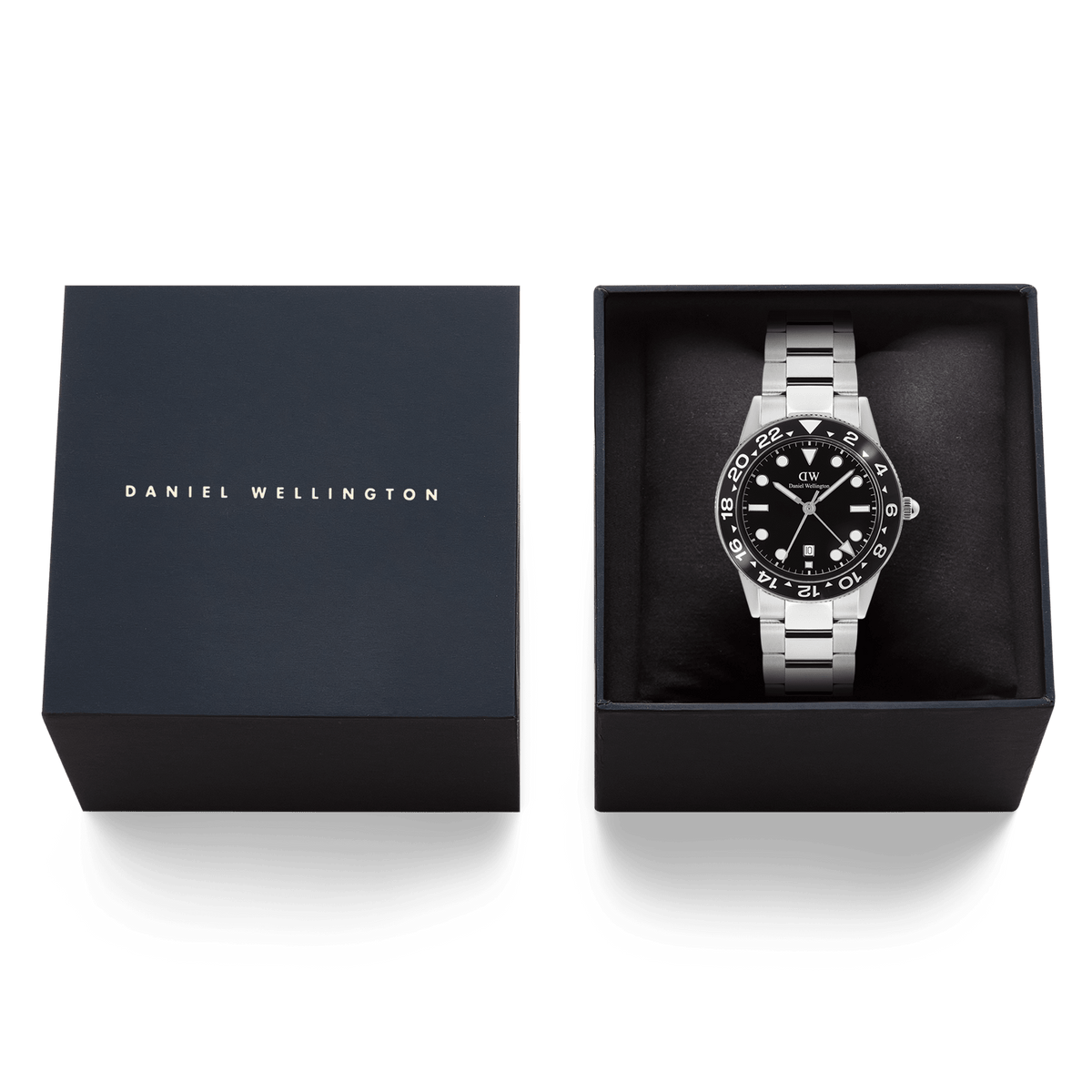 Daniel Wellington Iconic GMT Link Black Ceramic Bezel Silver watch presented in a branded gift box, featuring a stainless steel bracelet and bold black dial with ceramic bezel.