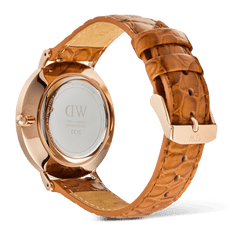 Rear view of the Classic Roman Numerals Date Light Brown Croc Belly Rose Gold watch, showing the rose gold case, engraved case back, and light brown croc-embossed leather strap with a matching rose gold pin buckle.