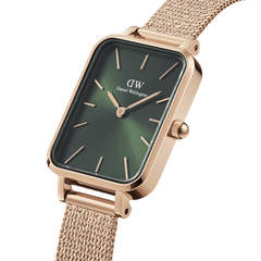 Quadro Pressed Melrose Emerald ladies watch with a rectangular emerald green dial, rose gold mesh strap, and minimalist gold hour markers, shown in a close-up angle highlighting its refined finish.