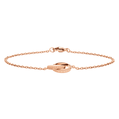 Elegant Elan Unity Bracelet Rose Gold with two intertwined rings and a delicate rose gold chain, featuring a secure clasp and minimalist styling suitable for layering.