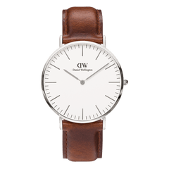 Classic St Mawes Silver watch with a polished silver case, minimalist eggshell white dial, and brown leather strap, showcasing a refined and versatile design suitable for everyday wear.