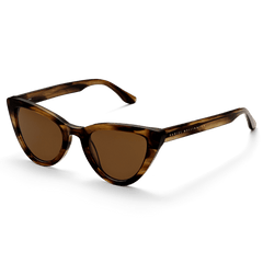 Lynx Bio-Acetate Brown Demi sunglasses with a cat eye silhouette, featuring a brown demi frame, amber lenses, and Daniel Wellington branding on the arm.