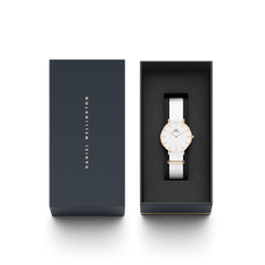 Petite Dover Rose Gold ladies watch with a white NATO strap and minimalist white dial, elegantly presented in a black Daniel Wellington gift box.
