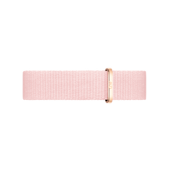 Soft pink NATO style watch strap made from recycled polyester, featuring a rose gold buckle and textured fabric, designed for Daniel Wellington watches.
