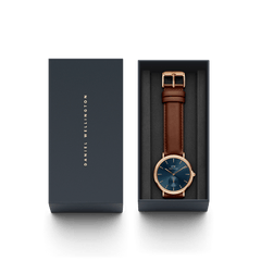 Classic Multi-Eye St Mawes Arctic Rose Gold men's watch with a blue chronograph dial and brown leather strap, presented in a sleek Daniel Wellington gift box.