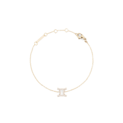 Crystal Zodiac Chain Bracelet Gold featuring a slim gold chain with adjustable sizing rings and a sparkling Gemini zodiac charm at the centre.