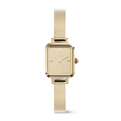 Quadro Mini Reflection Gold features a slim rectangular gold case, mirror-effect dial, and a delicate gold mesh strap, offering a refined and minimalist look suitable for everyday wear.