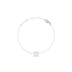 Delicate silver chain bracelet featuring a Gemini zodiac charm set with hand-placed crystals, adjustable for a comfortable fit and finished with a secure lobster clasp.