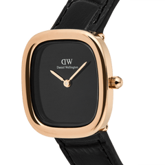 Close-up of the Margot Reading Onyx Ceramic Rose Gold ladies watch, highlighting its polished rose gold rectangular case, minimalist black dial, and pressed croc black leather strap.