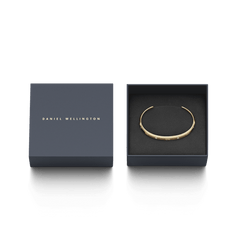 Classic Lumine Bracelet G presented in a Daniel Wellington gift box, showcasing its slim gold cuff and sparkling crystal accents, ideal for gifting or special occasions.