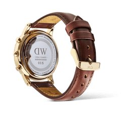 Rear view of the Iconic Chronograph St Mawes Arctic Panda Gold watch showing the gold-plated case back, engraved details, and brown genuine leather strap with gold pin buckle.