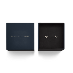 Mirelle Heart Earring Rose Gold presented in a navy Daniel Wellington gift box, featuring petite heart-shaped studs with a rose gold finish and white cubic zirconia crystals.