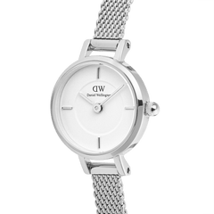 Close-up of the Petite Mini Sterling watch featuring a 19mm round silver case, minimalist white dial, and a fine stainless steel mesh strap, highlighting its refined and elegant design.