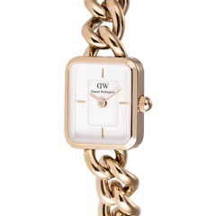 Close-up of the Jolie Chain Rose Gold watch showing its square white dial, minimalist hour markers, and chunky rose gold chain bracelet with a polished finish.