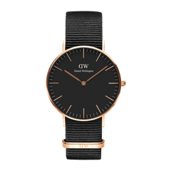 Classic Cornwall Black Rose Gold watch with a sleek black dial, rose gold stainless steel case, and a black NATO style polyester strap, ideal for both formal and casual wear.
