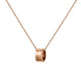 Rose gold necklace featuring a minimalist ring pendant on a delicate adjustable chain, crafted from stainless steel with a polished finish for a modern, elegant look.