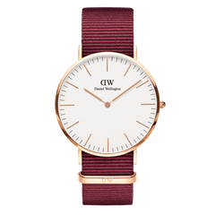 Classic Roselyn Rose Gold ladies watch with a slim rose gold case, minimalist white dial, and ruby red NATO fabric strap, designed for everyday comfort and versatile style.