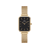 Quadro Pressed Evergold Black Gold features a rectangular gold case, striking black dial, and a slim gold mesh strap, offering a minimalist and elegant look ideal for everyday wear.