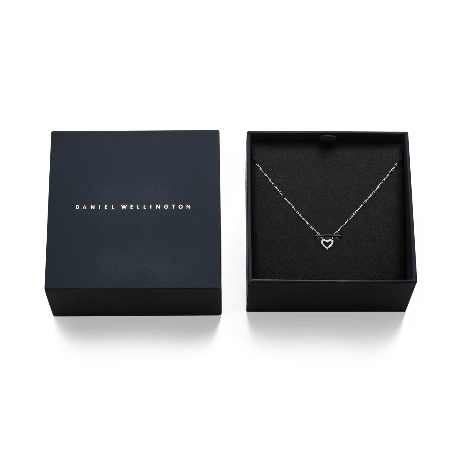 Mirelle Heart Necklace Silver displayed in an elegant Daniel Wellington gift box, featuring a fine silver chain and open heart pendant with sparkling cubic zirconia crystals.
