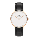 Classic Sheffield Rose Gold watch with a minimalist eggshell white dial, slim rose gold hands, and a polished rose gold case paired with a genuine black leather strap.