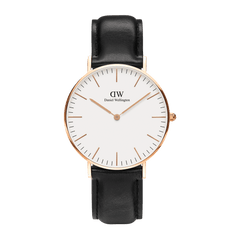 Classic Sheffield Rose Gold watch with a minimalist eggshell white dial, slim rose gold hands, and a polished rose gold case paired with a genuine black leather strap.