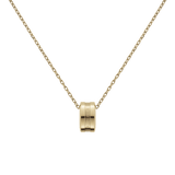 Elan Necklace Gold featuring a polished gold ring pendant engraved with the Daniel Wellington logo, suspended on a delicate adjustable chain.