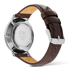 Rear view of the Classic Roman Numerals Date Dark Brown Croc Belly Silver watch, showing the polished stainless steel case back, engraved branding, and textured dark brown crocodile-embossed genuine leather strap with a silver pin buckle.