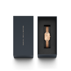Quadro Pressed Unitone rose gold watch with a pressed mesh strap, elegantly presented in a branded Daniel Wellington gift box, ideal for gifting or adding to your collection.