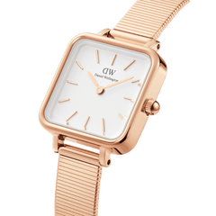 Quadro Studio Rose Gold watch featuring a square eggshell white dial, slim rose gold hour markers, and an elegant piano link rose gold strap with a polished finish, designed for women seeking a modern classic accessory.