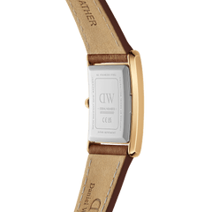 Bound Durham Gold watch showing the stainless steel back of the curved rectangular gold case, with a light brown genuine leather strap and visible stitching, highlighting quality craftsmanship and Japanese movement.