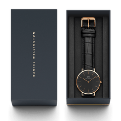 Classic Reading Black Rose Gold watch presented in its branded gift box, featuring a black croc-embossed leather strap and a slim rose gold case for a sophisticated and timeless gift option.