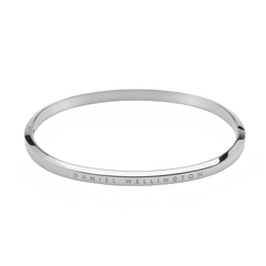 Classic Bangle Silver featuring a slim, polished stainless steel design with the Daniel Wellington logo engraved along the edge, ideal for layering or wearing alone.