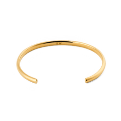 Arch Cuff Gold 4mm bracelet featuring a slim, open-ended shape with a polished gold finish and discreet logo inside, designed for comfortable daily wear and easy stacking with other jewellery.