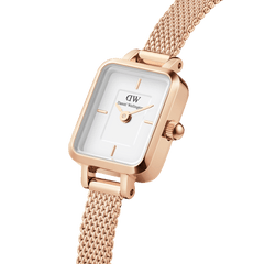Quadro Mini Melrose featuring a rectangular white dial, rose gold mesh strap, and polished rose gold case, highlighting its minimalist design and delicate styling for women.