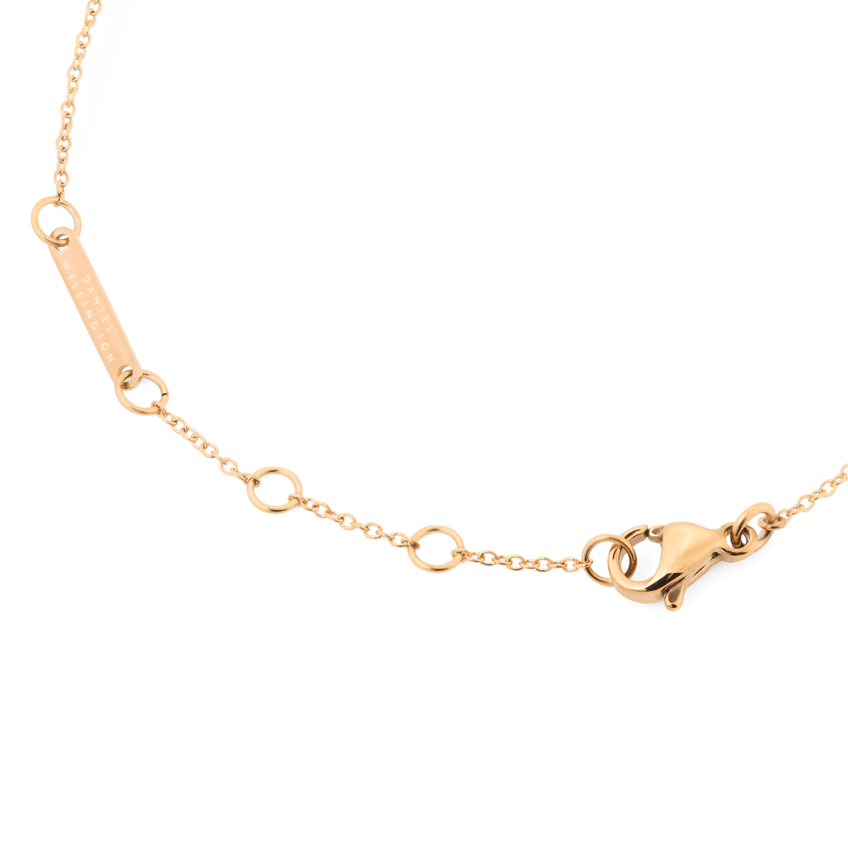 Adjustable rose gold bracelet clasp and chain detail, featuring multiple fastening loops and a branded tag for a secure and comfortable fit.