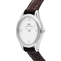 Close-up of the Ophelia Mini Dark Brown Lizard White Guilloché Silver watch, highlighting the polished oval silver case, textured white guilloché dial with Roman numerals, and the dark brown lizard-embossed leather strap.
