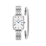 Rectangular silver ladies watch with a five-link bracelet, white dial, Roman numerals, and blue hands, paired with a slim silver bracelet featuring crystal accents and engraved details.