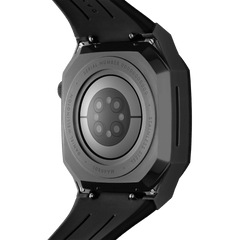 Back view of the Switch Black Black Apple Watch case, highlighting the brushed stainless steel construction, engraved details, and integrated FKM rubber strap for Series 6, 5, 4, and SE models.