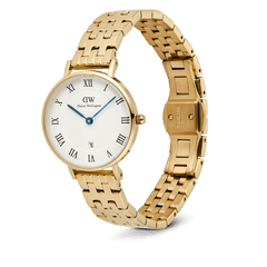 Petite Roman Numerals Date 5-link Gold ladies watch featuring a slim gold 5-link bracelet, white dial with Roman numerals, blue hands, guilloché texture, and a date window at 6 o’clock, shown with an open butterfly clasp.