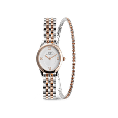 Ophelia Mini & Tennis Bracelet Apricot Silver Set featuring a petite oval watch with a two-tone silver and rose gold strap, paired with a slim tennis bracelet adorned with apricot-coloured crystals.