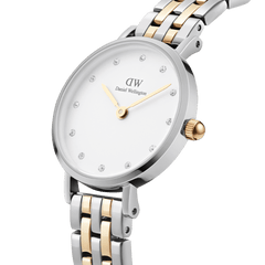 Close-up of the Petite Lumine 5-link two-tone ladies watch, showing its eggshell white dial with crystal markers and a polished silver and gold stainless steel bracelet, highlighting the elegant jewellery-inspired design.
