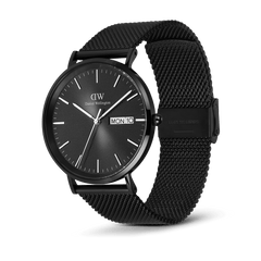 Classic Day Display Onyx Black men's watch featuring a textured black dial, day and date display, and an adjustable black mesh stainless steel strap.