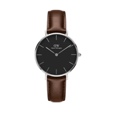 Daniel Wellington Petite Bristol Black Silver watch featuring a minimalist black dial, polished silver case, and a dark brown genuine leather strap with subtle stitching.
