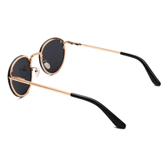 Arch Steel Black sunglasses with round dark nylon lenses, rose gold plated stainless steel frame, adjustable silicone nose pads, and black acetate temple tips, shown from an angled rear view.