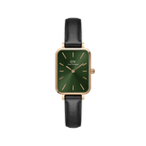 Quadro Pressed Sheffield Emerald Rose Gold watch with a rectangular rose gold case, emerald green dial, and black leather strap, showcasing a minimalist and elegant design suitable for everyday wear.