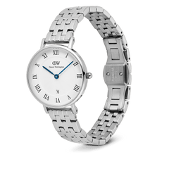 Petite Roman Numerals Date 5-link Silver watch featuring a polished stainless steel bracelet, white guilloché dial with Roman numerals, blue hands, and a date window at 6 o’clock, shown with an open butterfly clasp.