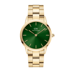 The Iconic Link Emerald Gold watch features a polished gold stainless steel bracelet and a striking emerald green dial with minimalist gold hour markers, offering a refined and modern look for women.