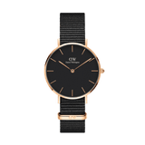 Petite Cornwall Black Rose Gold women’s watch with a slim black dial, rose gold stainless steel case, and an adjustable black NATO fabric strap, showcasing a minimalist and elegant design.