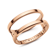 Rose gold Elan Dual Ring featuring a double-band design with minimalist lines, crafted from stainless steel and engraved with the Daniel Wellington logo on the inside.