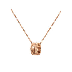 Rose gold Elevation Necklace with a bold geometric ring pendant and intricate detailing, hanging from a fine cable chain.